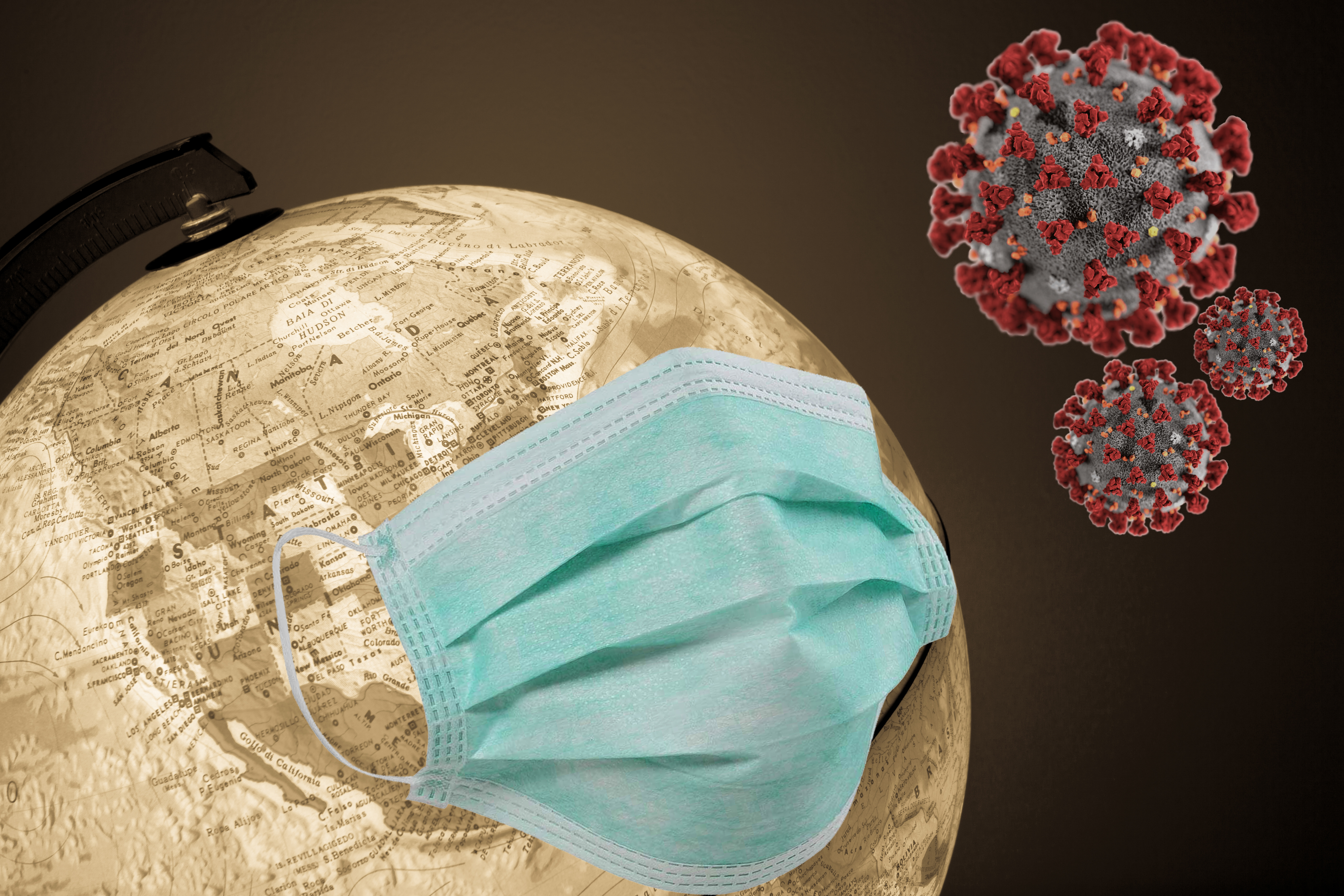 Image of a globe with a medical mask and virus particles symbolizing worldwide effects of Covid-19. 