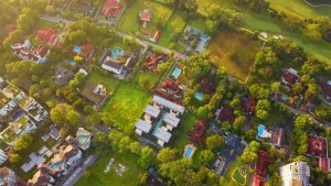 Aerial view of an urban real estate development symbolizing real estate law and HOA's. 