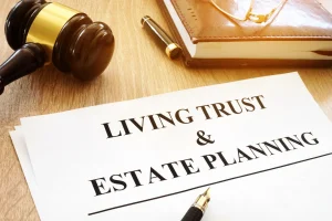 Image of a Living Trust and Estate Planning on a sheet of paper with a pen, notebook and gavel.
