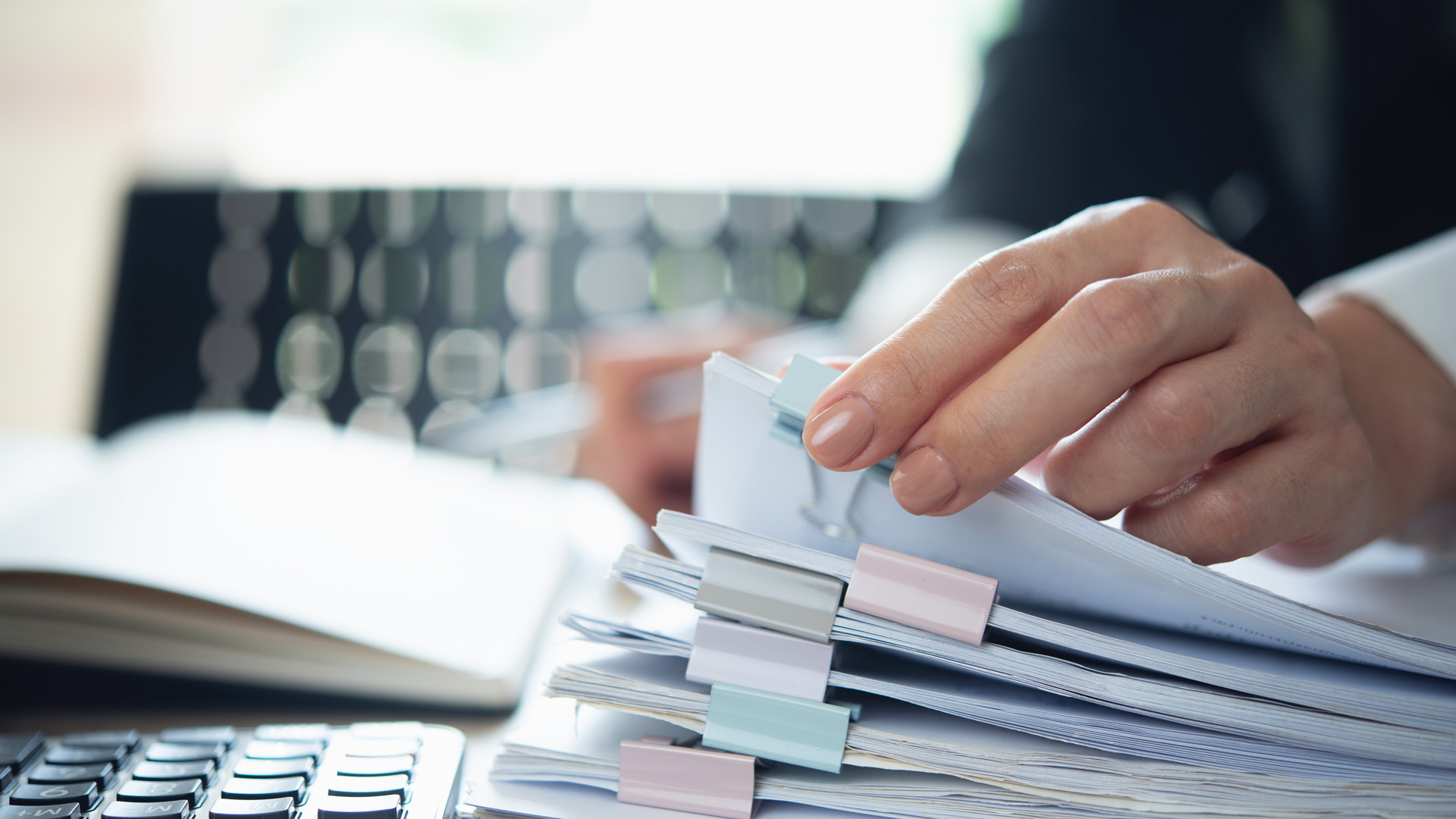 Corporate Transparency Act Update blog image showing piles of documentation